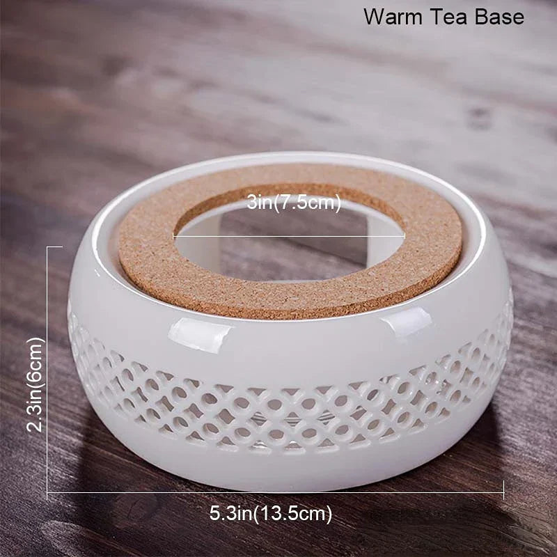 theepot met filter en warmhouder